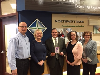 Image of Northwest Bank staff receiving the corporate crown award