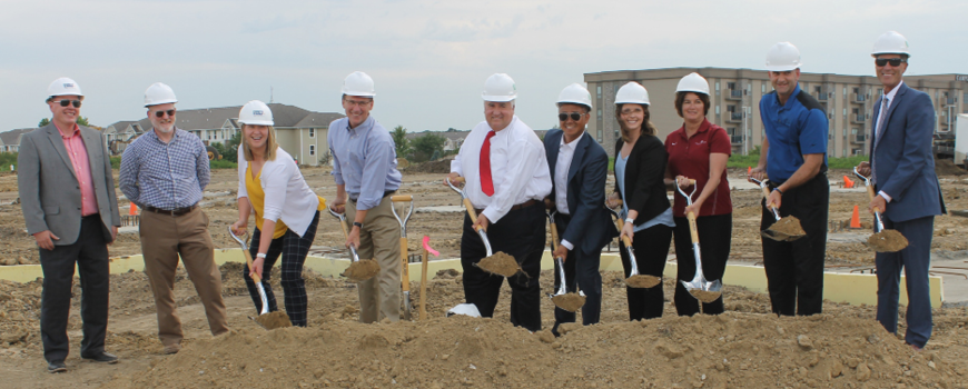 Picture of Ankeny Northwest Bank Employees breaking ground at the new build site.