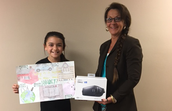 Image of Aracely from Estherville our 1st place winner with Jody Schroeder, Personal Banker